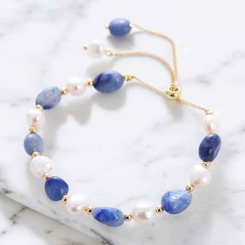 Pulsera de acero con perla de agua dulce