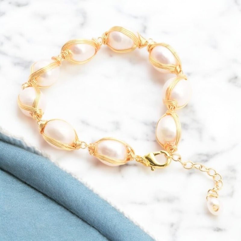 Pulsera de acero con perla de agua dulce