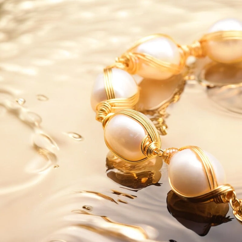 Pulsera de acero con perla de agua dulce