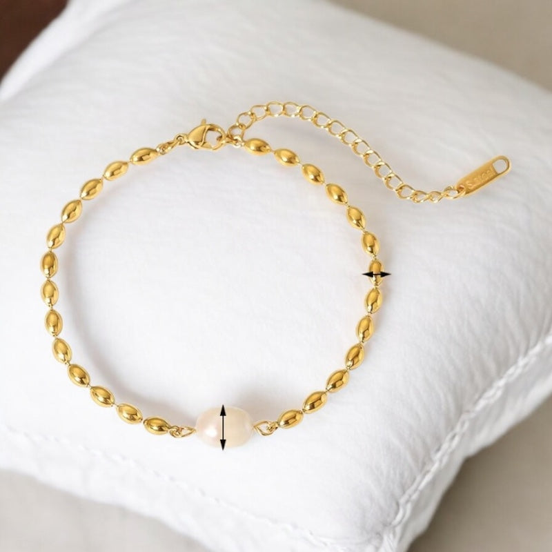 Pulsera de acero con perla de agua dulce